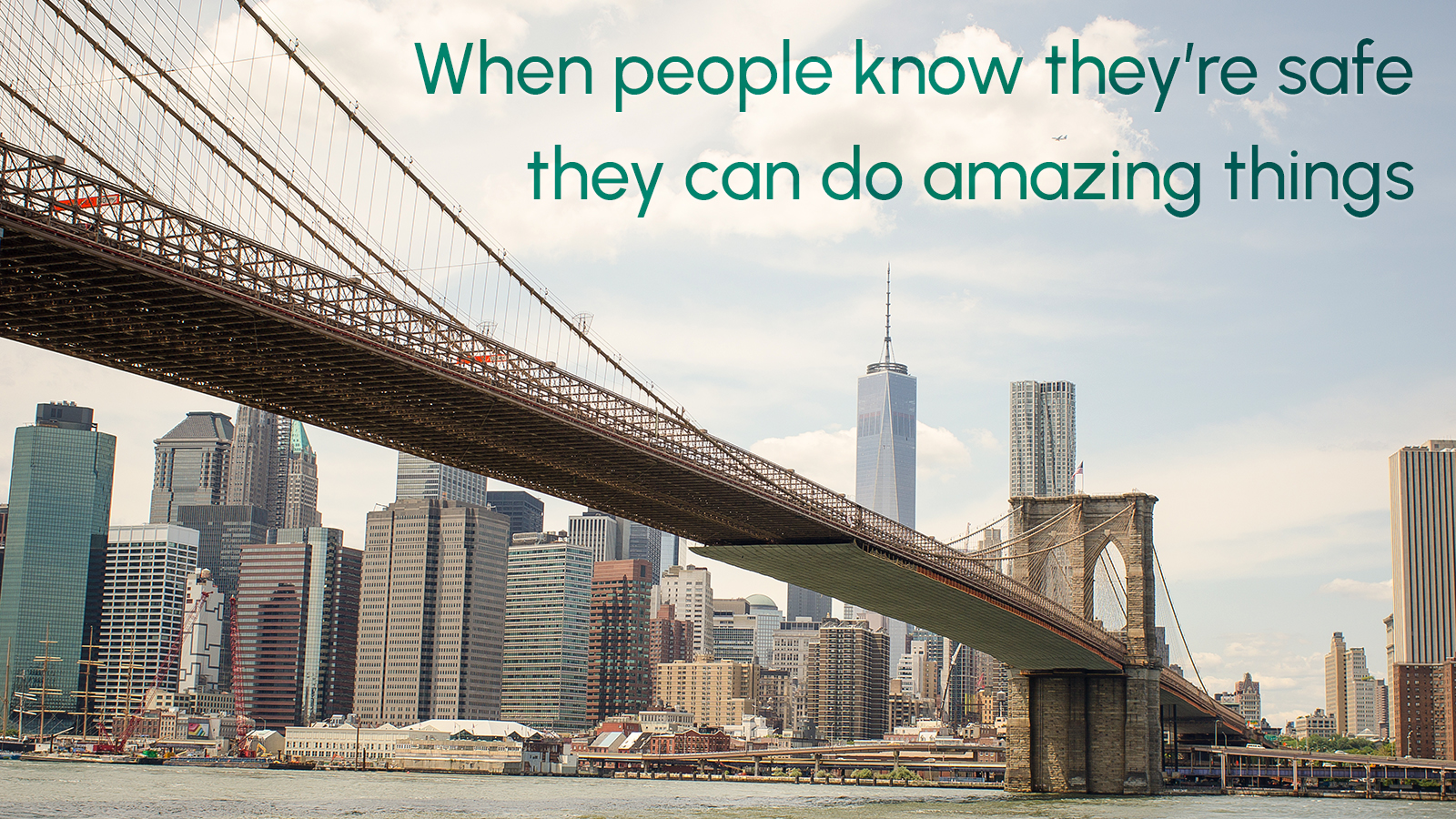 Photo of NYC bridge with overlay text, "When people know they're safe they can do amazing things"